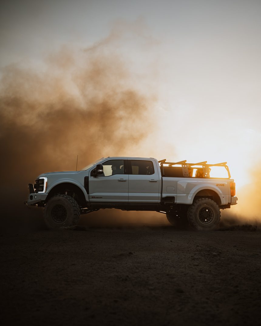 Truman build kicking up dust at sunset